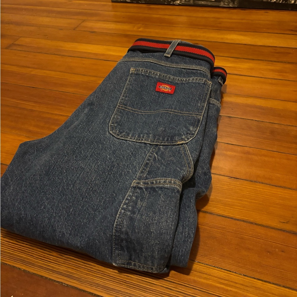 Blue Relaxed Jeans with Classic Denim Texture and Contrasting Stitching